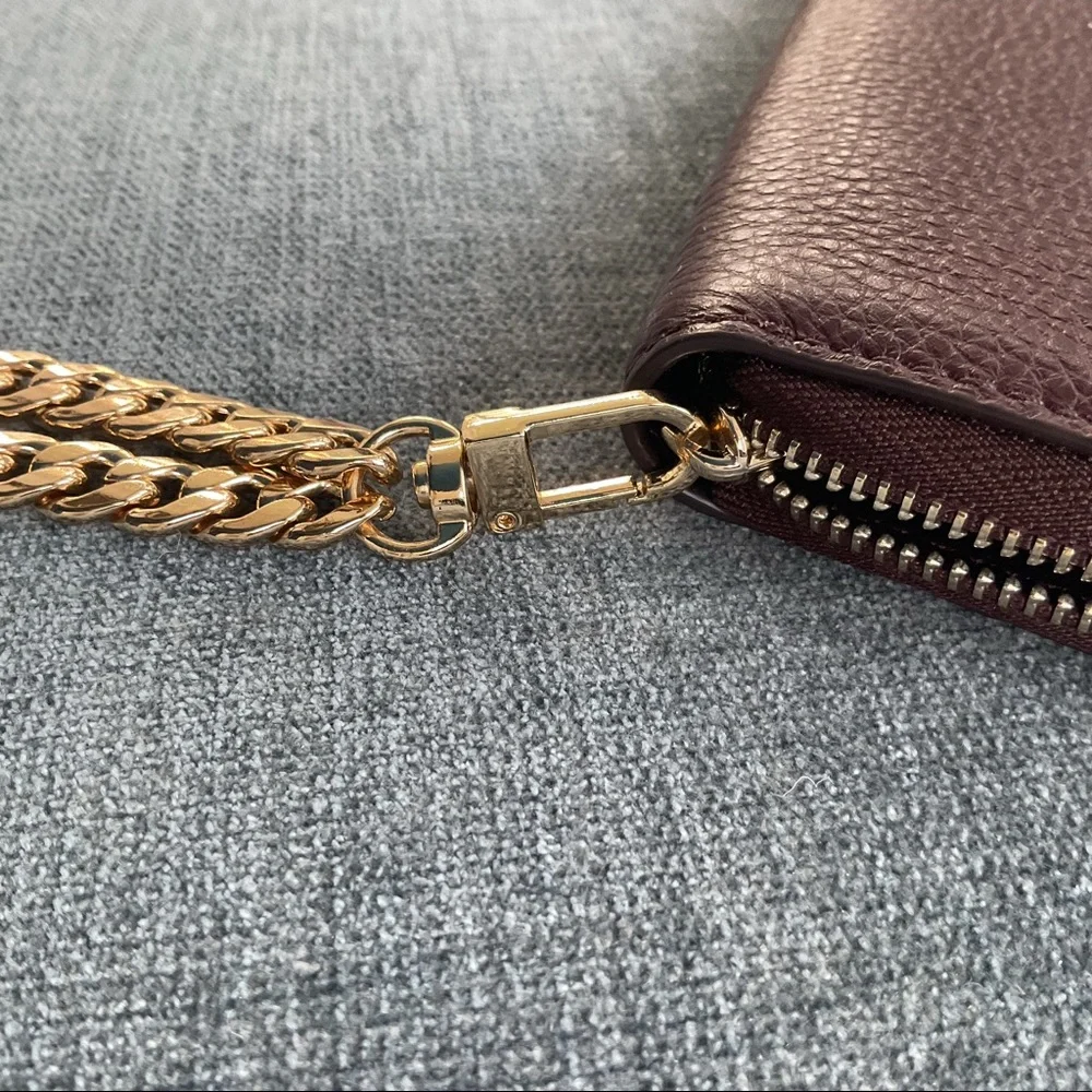 Kate Spade Jackson 1/2 Moon burgundy wristlet clutch leather gold chain